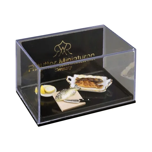 001.485/6 - Miniatur, gegrillter Fisch mit Zitrone