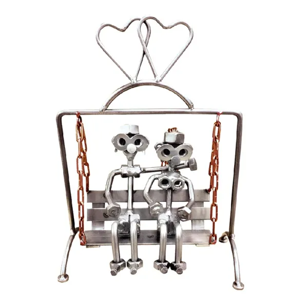 706 - Figure "Lovers on a Garden Swing"